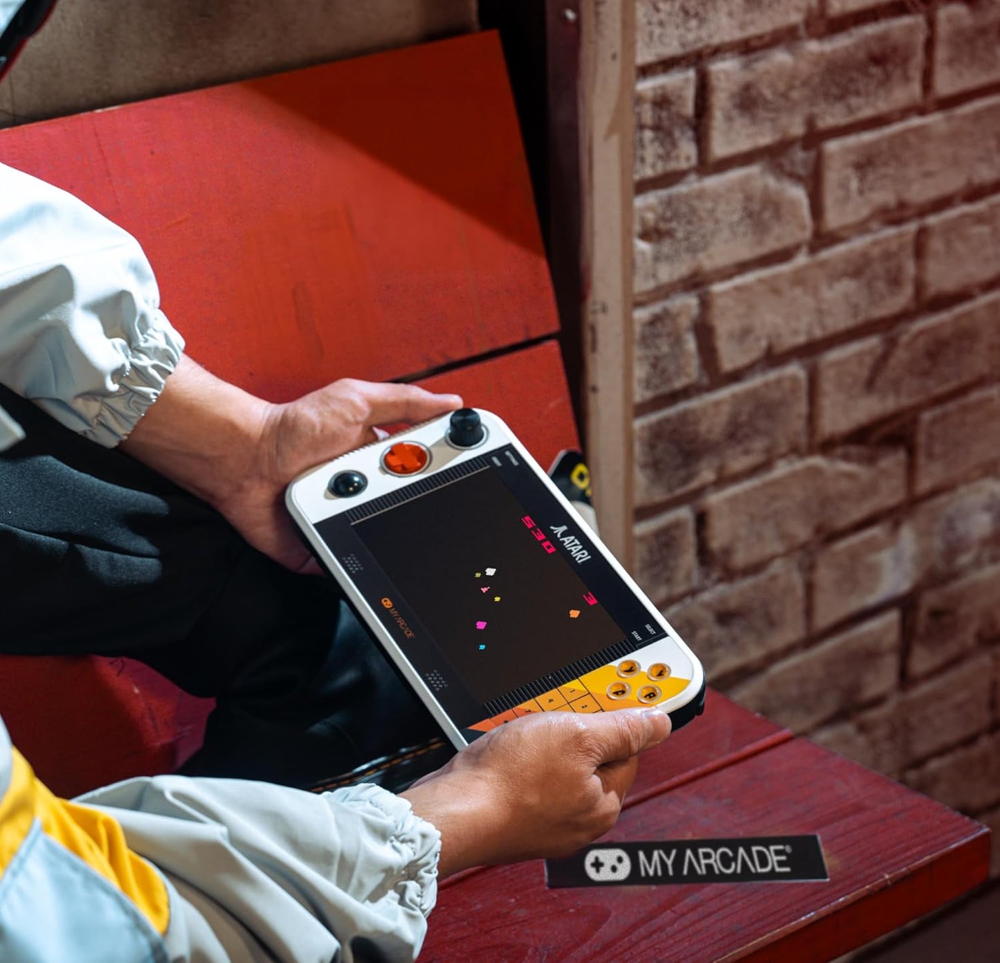 Atari Gamestation Go: Rechargeable Battery, over 200+ Preloaded Retro Video Games Including Pac-Man, Recharged, & Balls of Steel, Wi-Fi, Smartglow, 7 Inch Display